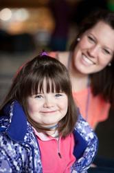 Smiling girl and her peer mentor